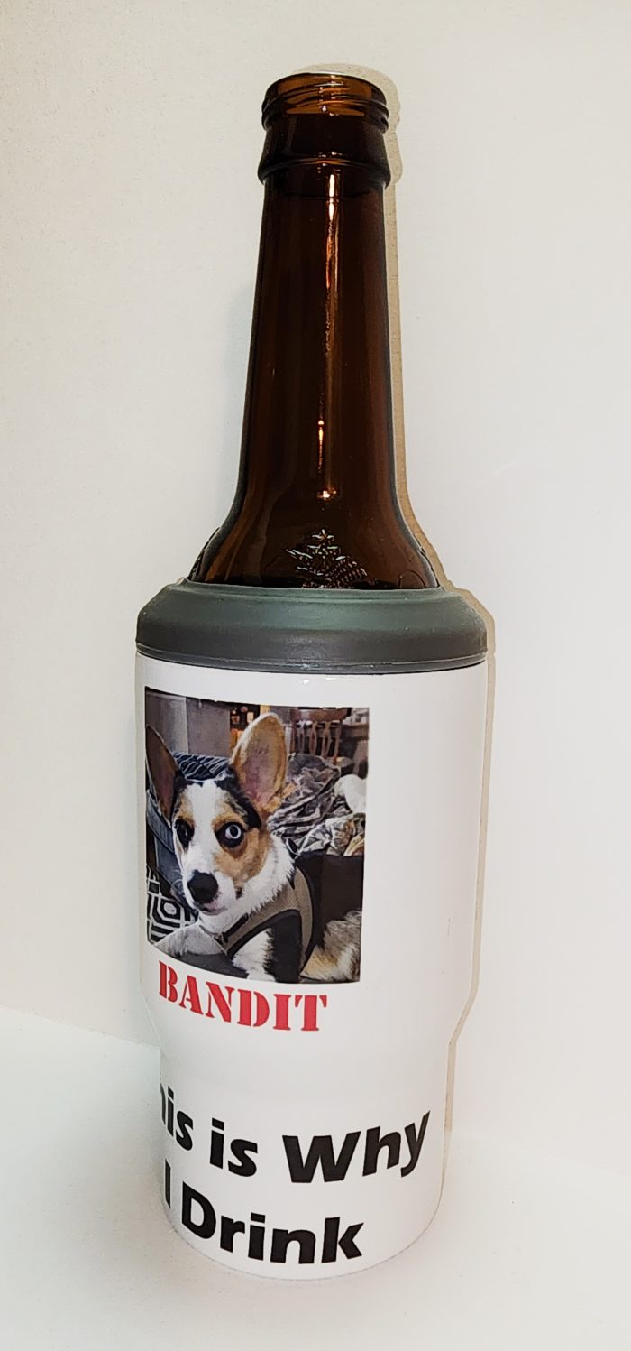 A bottle of beer with a picture of a dog on it.