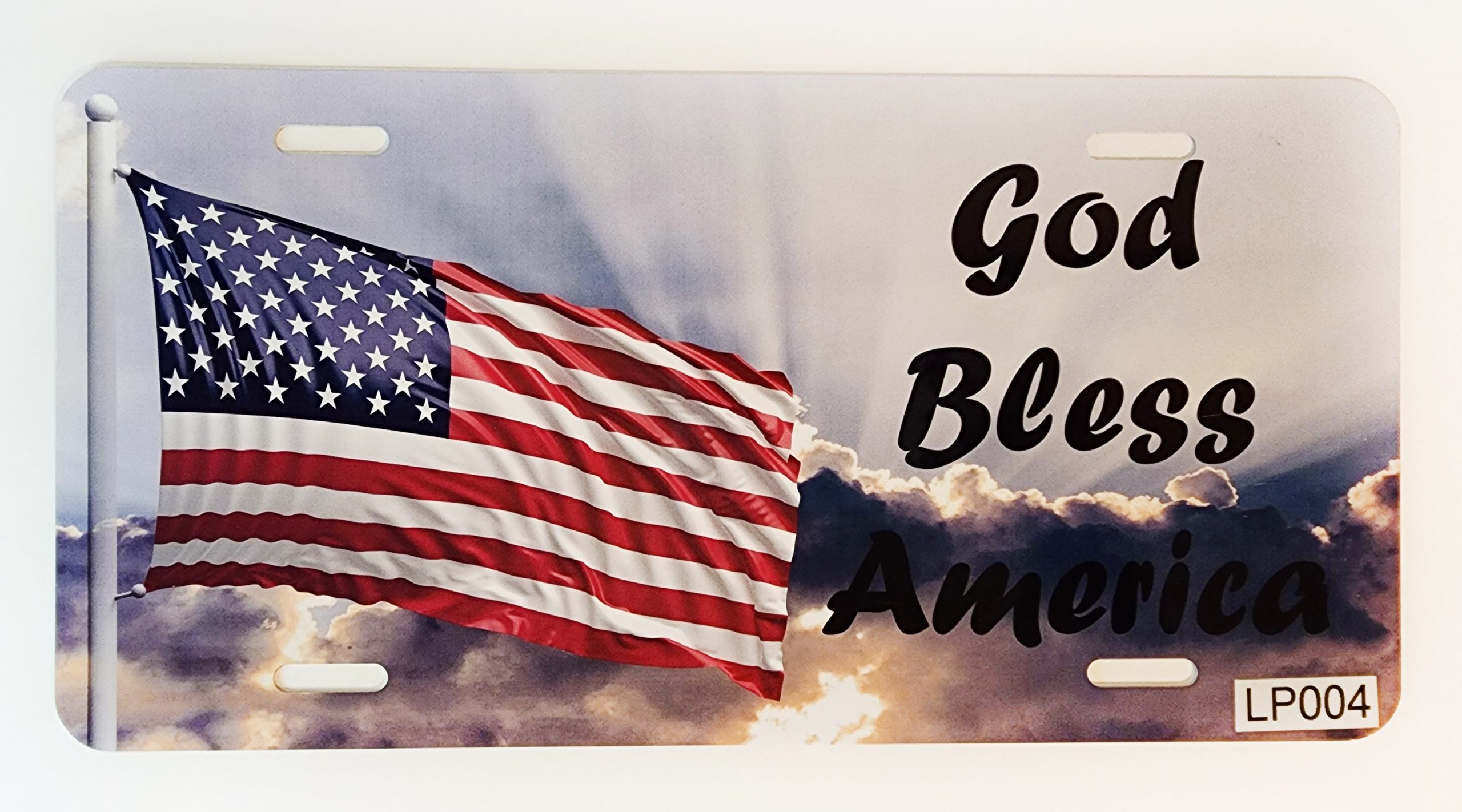 A picture of the american flag with god bless america written on it.