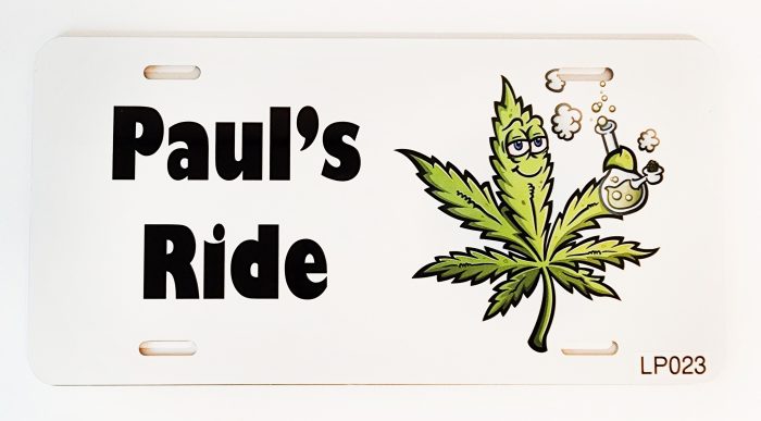 A white license plate with a cartoon marijuana leaf and smoke coming out of it.