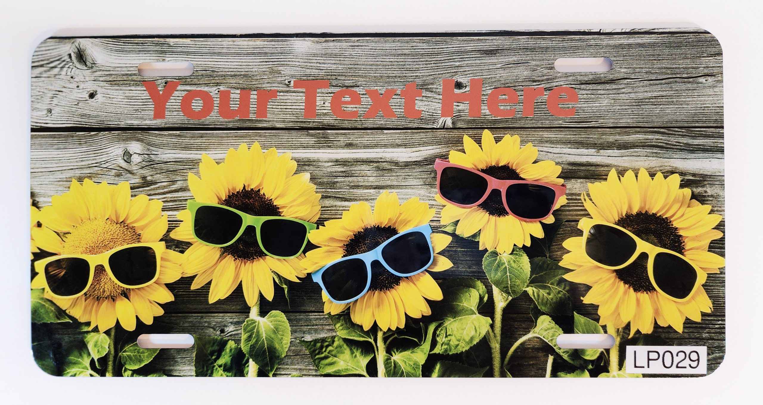 A group of sunflowers with sunglasses on them.