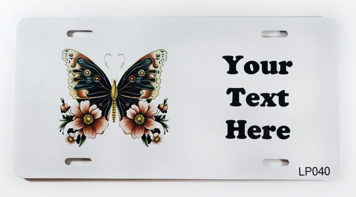 A white plate with a black butterfly and flowers on it.