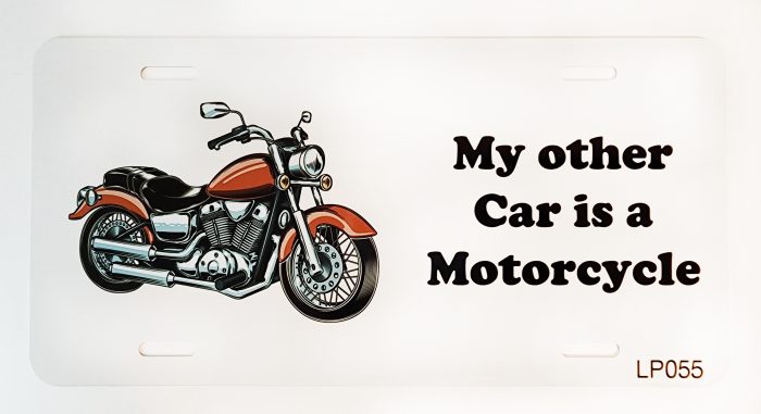 A motorcycle is shown with the words " my other car is motoretta ".