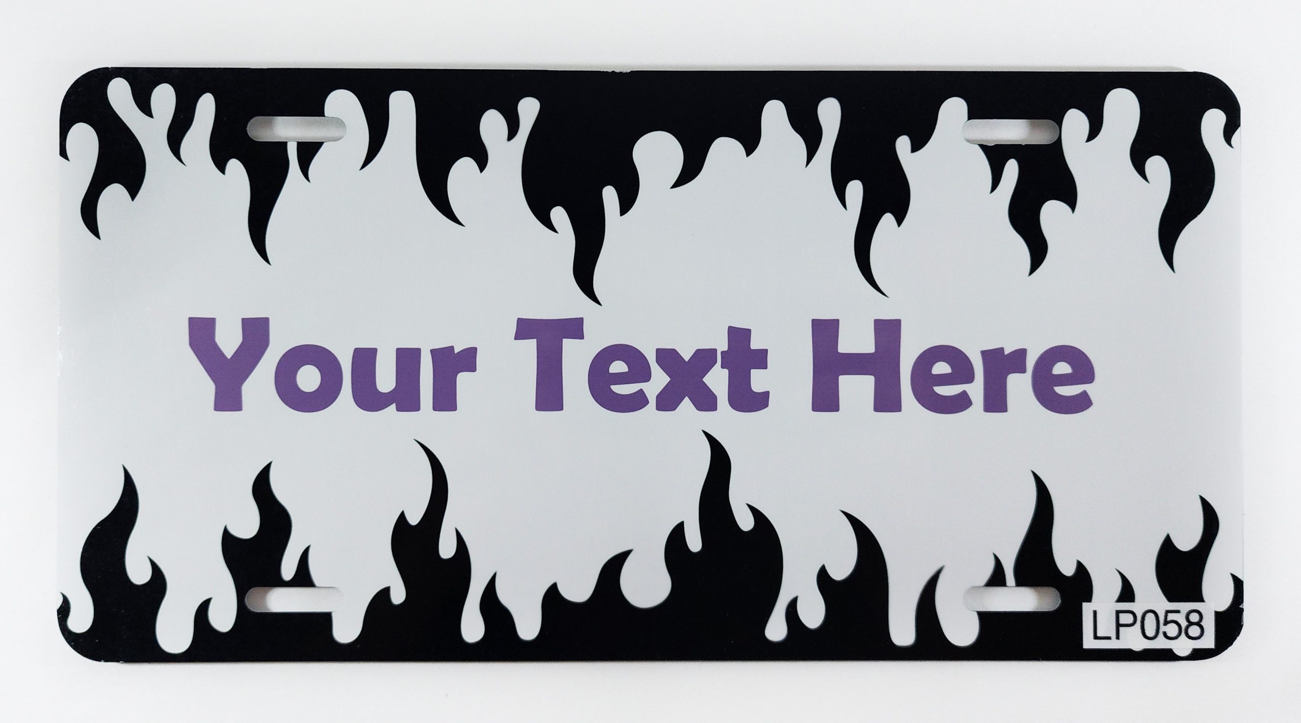 A black and white flame license plate with purple text.