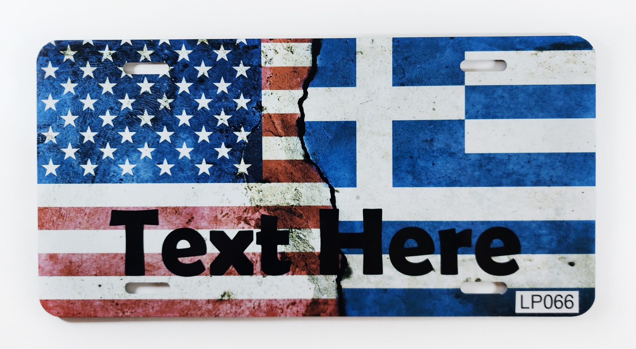 A close up of an american flag and greek flag license plate