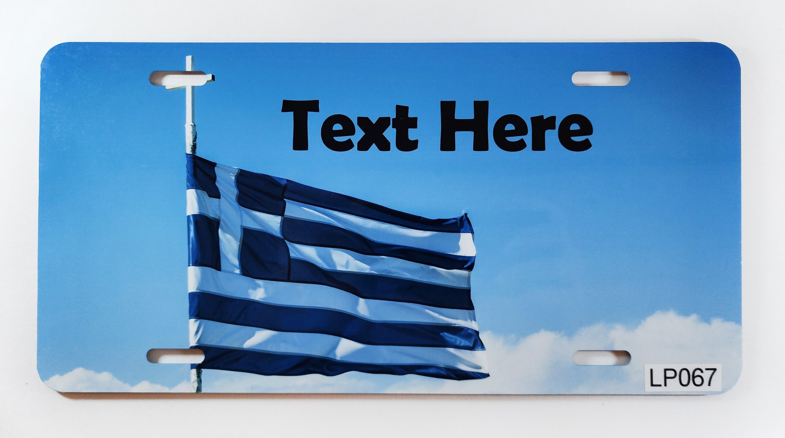 A flag of greece with the text " text here ".