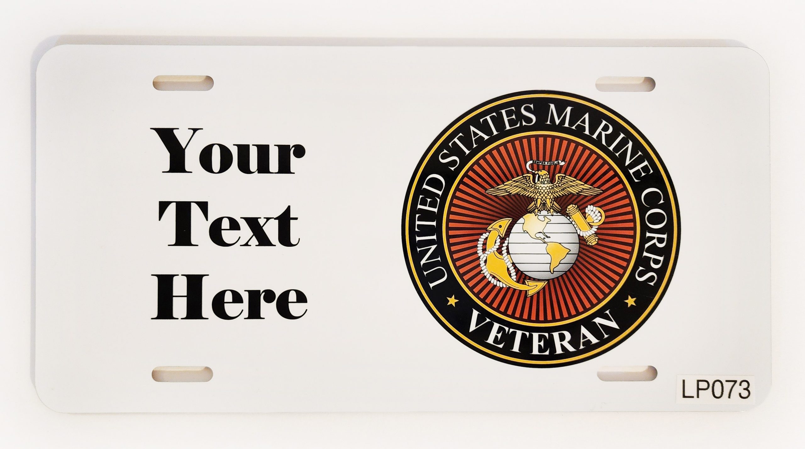 A white license plate with the marine veteran logo.