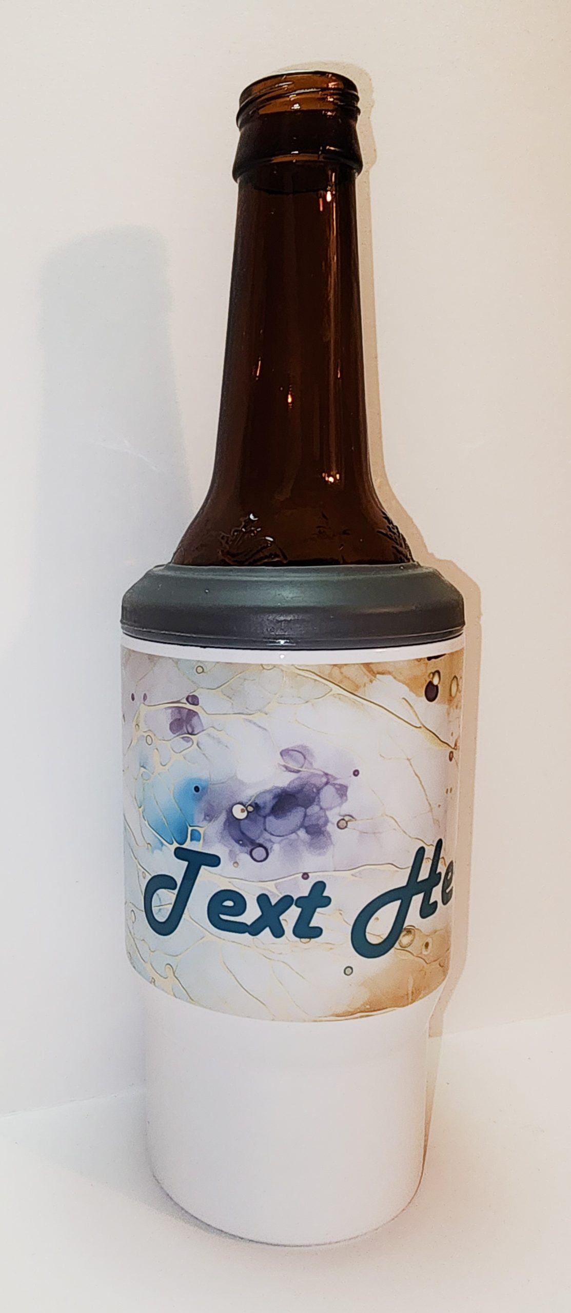 A bottle of beer with the name " text it ".