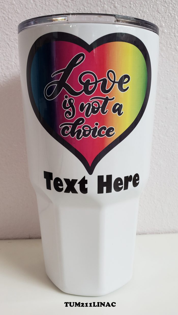 A white cup with a rainbow heart on it.