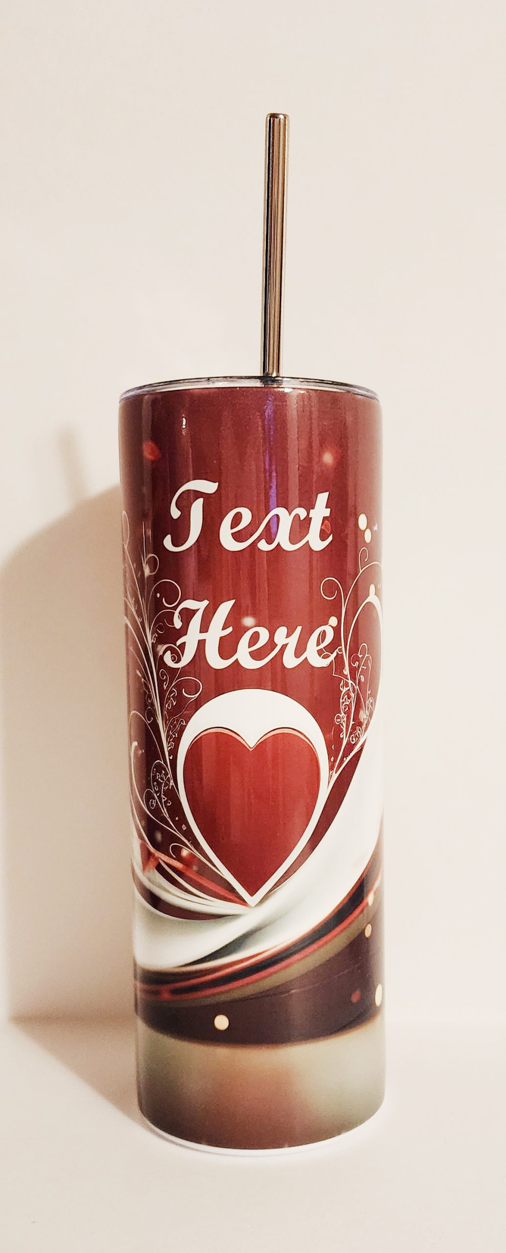 A red can with a heart on it.