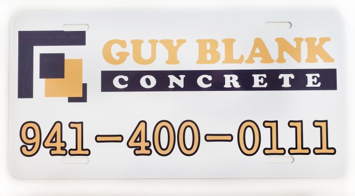 A sign for guy black concrete