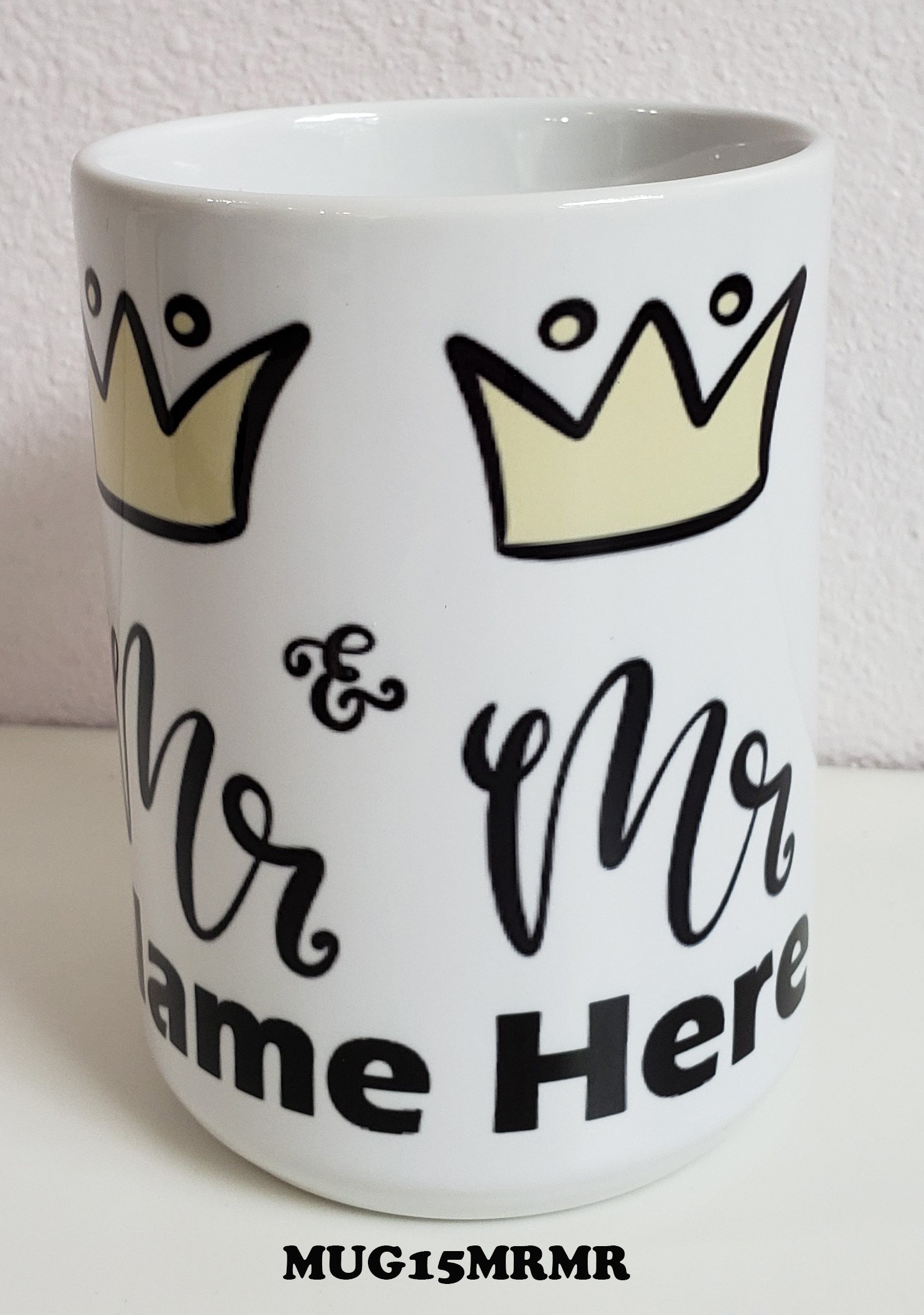 A coffee mug with the words " mr. And mrs." written on it