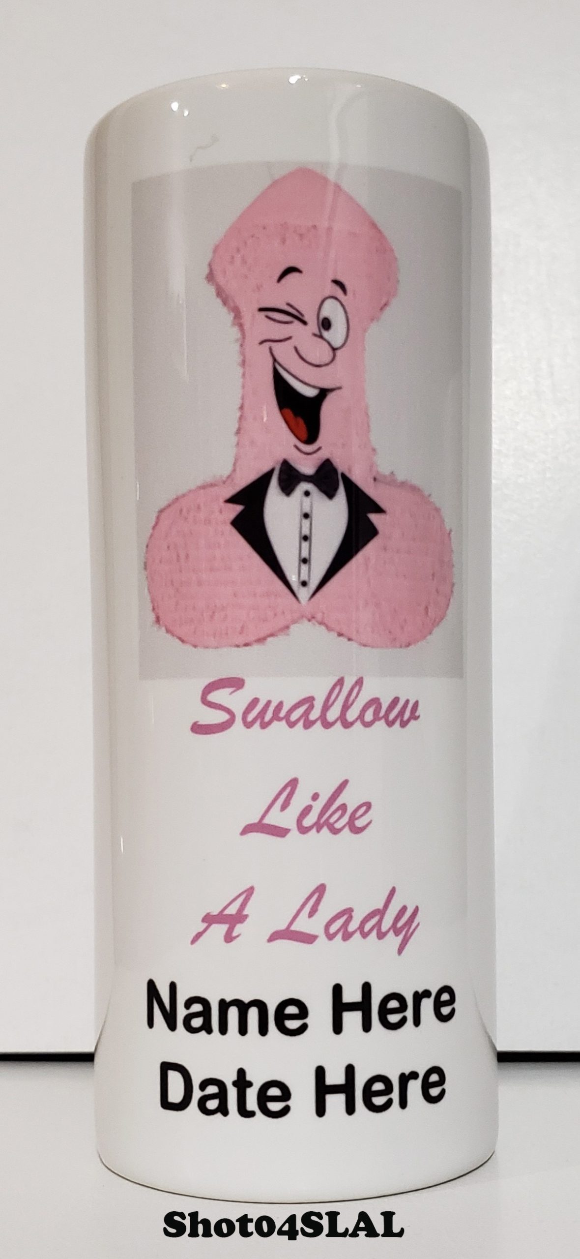 A close up of a bottle with the words " swallow like a lady ".