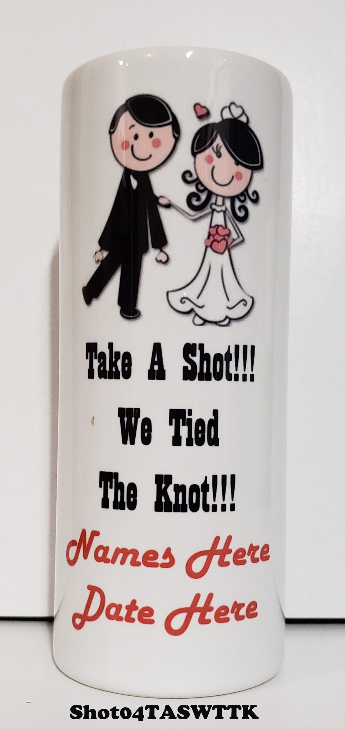 A wedding shot glass with the words " take a shot we tied the knot ".