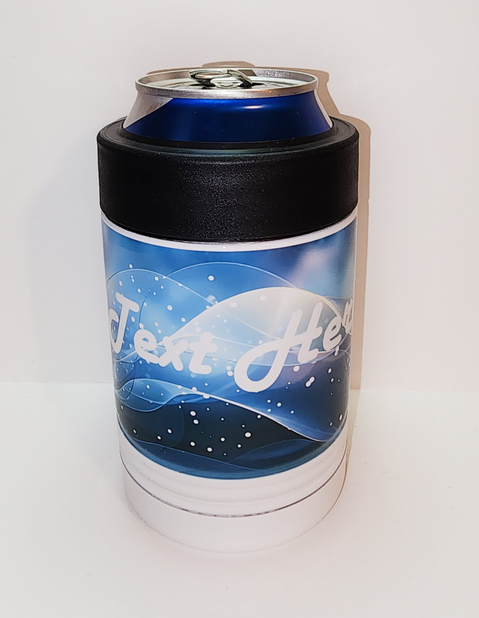 A can holder with a picture of the ocean.