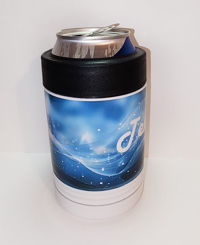 A can holder with a picture of the ocean on it.