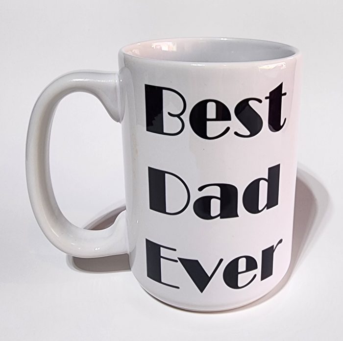 A white coffee mug with the words " best dad ever ".