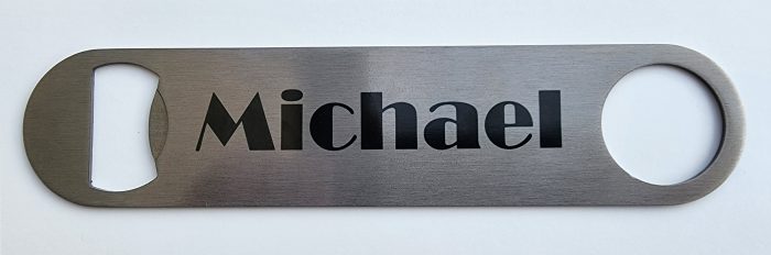 A metal sign with the name michael on it.