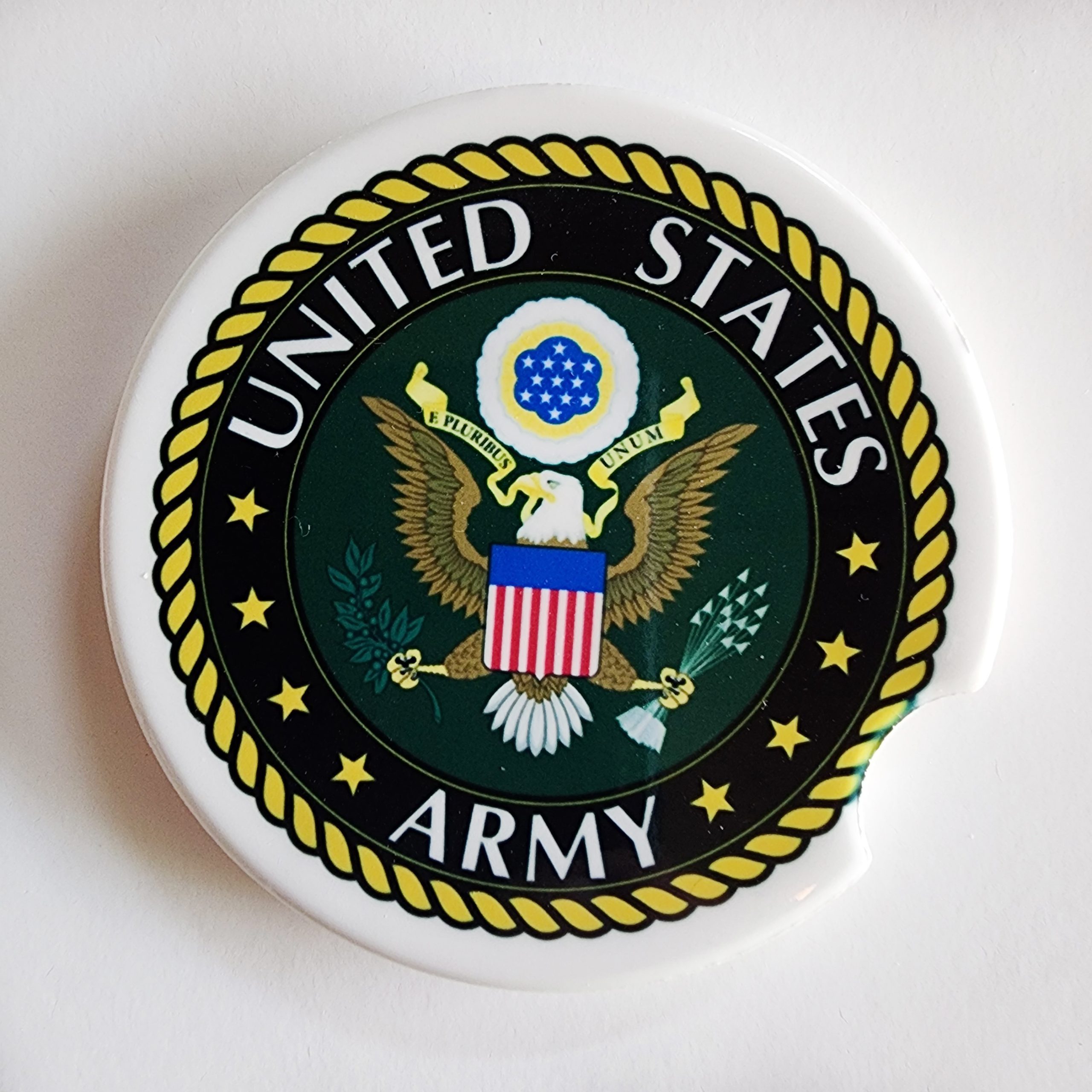 A white plate with the seal of the united states army.