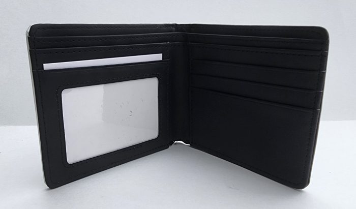 A black wallet with two cards inside of it.