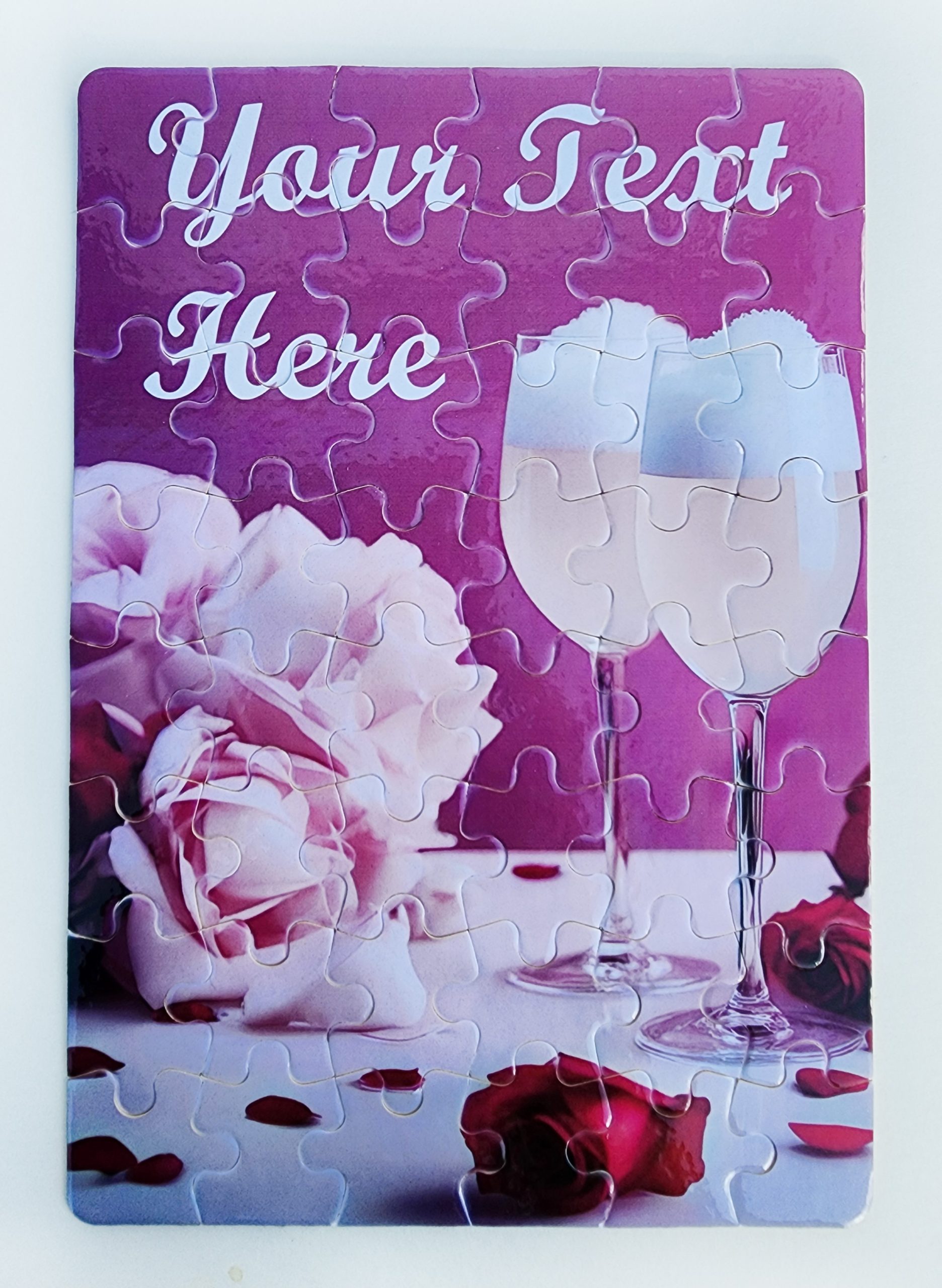 A puzzle with two glasses of wine and roses.