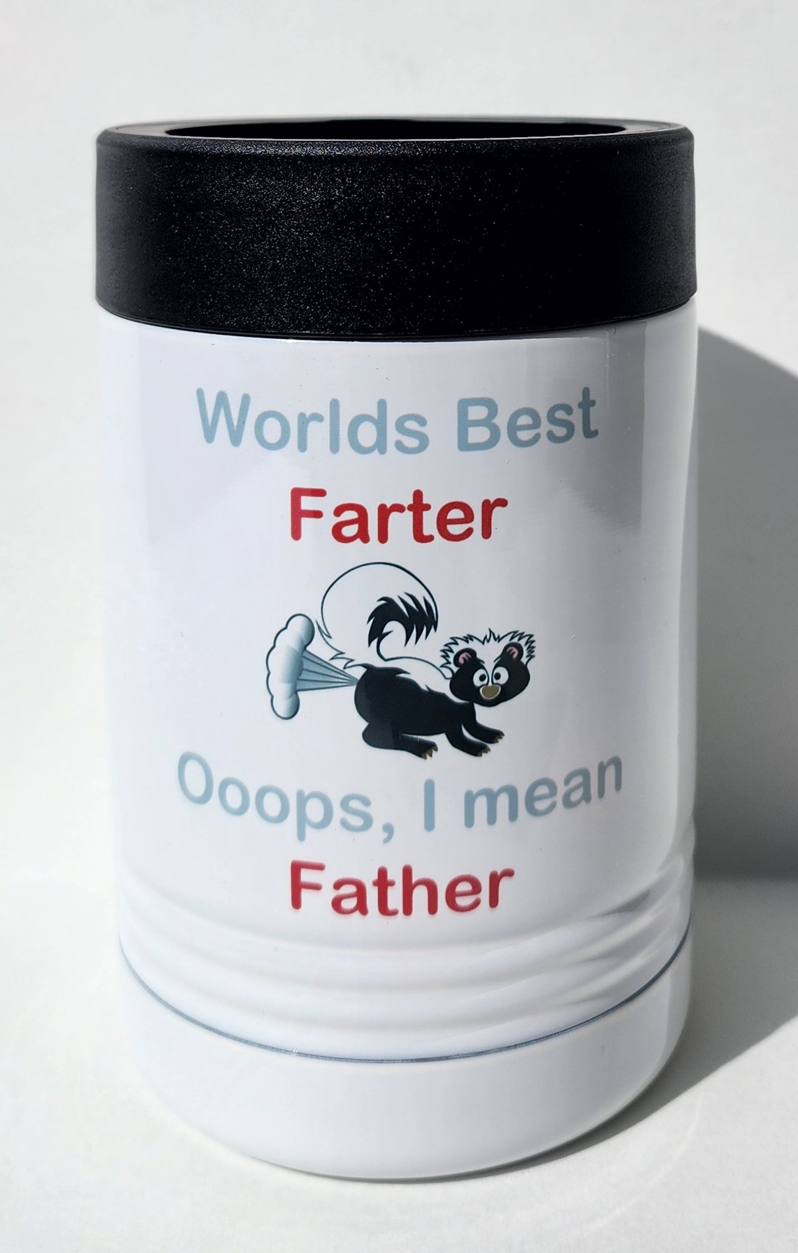 A can that says " worlds best farter ooops, i mean father ".