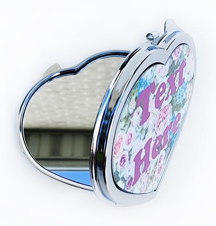 A heart shaped mirror with the words " text here ".